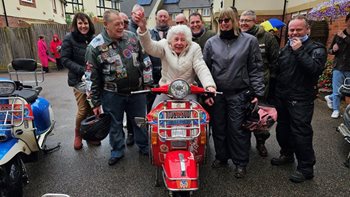 Halstead care home resident celebrates her birthday with local scooter club