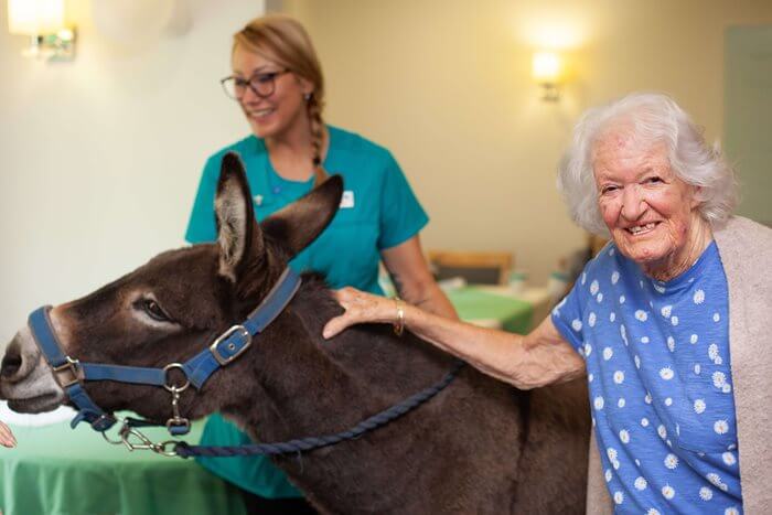 Mavis was thrilled when her favourite animal trotted into Winchcombe Place care home for a visit.