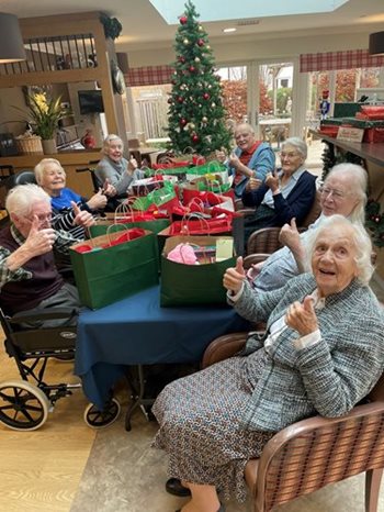 ‘Tis the season for giving – Cheltenham care home Christmas hampers are a hit