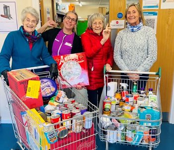 Sway care home support local community with food bank donation