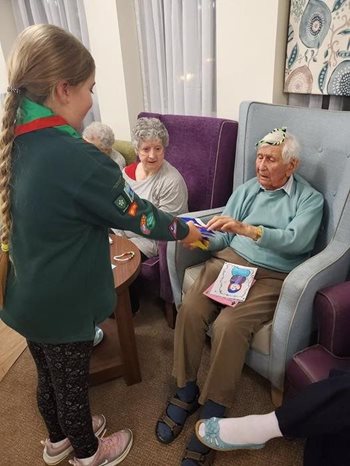 Scout’s honour! Local Cubs troop visit residents at Orpington care home