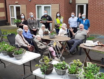 Unbe-leaf-able! Poole care home creates 30 hanging baskets for charity 