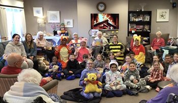 Horley care home residents read bedtime stories to local children