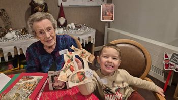 Nursery joins Poole care home for journey into Christmas past