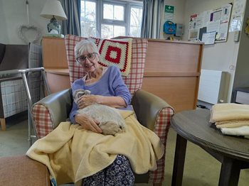 Stansted care home enjoys kidding around with four-legged friends