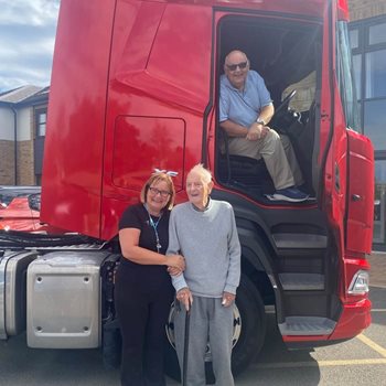Former lorry driver surprised with HGV visit
