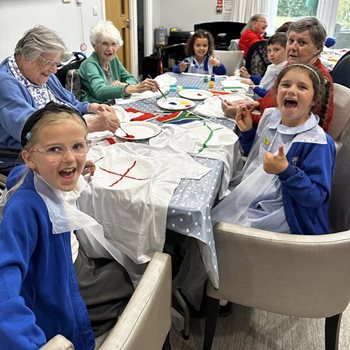 Fleet care home teams up with schoolchildren for matchday magic