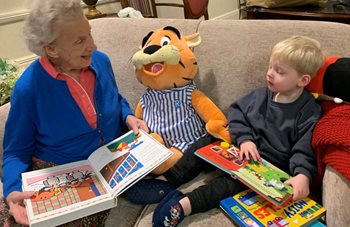 A novel idea – Mobberley care home residents read bedtime stories to local children
