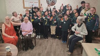 Scouts join Chingford care home for journey into Christmases past 
