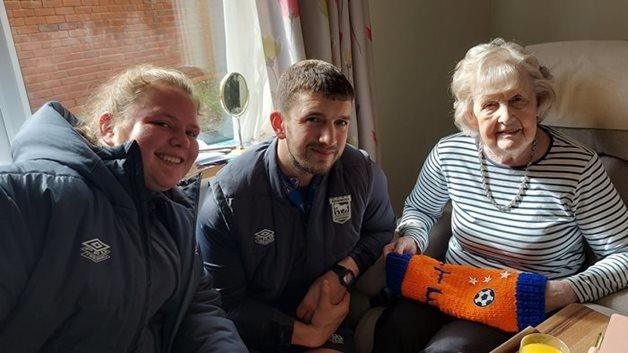Football team surprises local care home resident super fan
