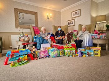 Piece-ing it all together! Chester care home residents check toy donations for local children