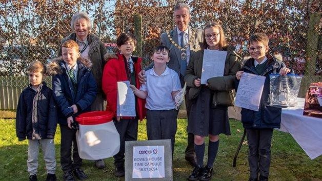Hailsham care home welcomes pupils to re-bury 60-year-old time capsule