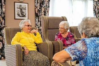When should someone with dementia go into a care home?