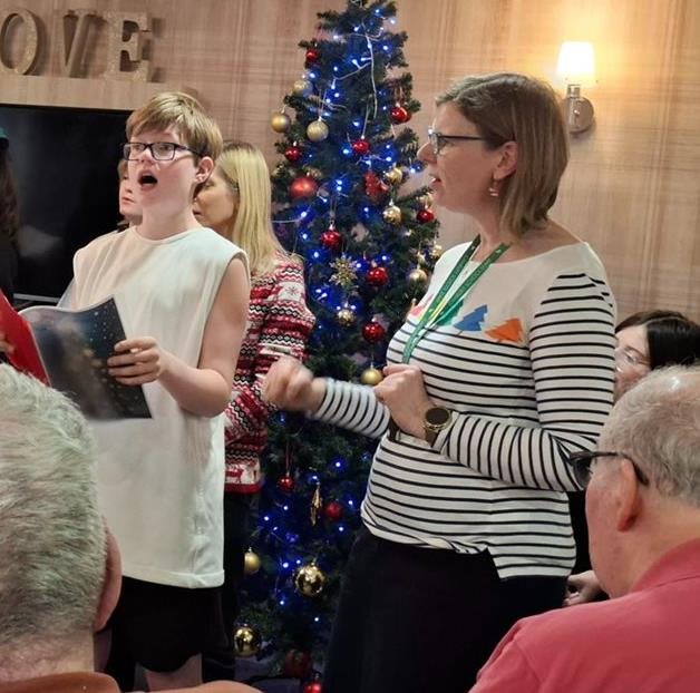 Local schoolchildren join Kingston Vale care home for a journey into Christmas past