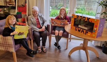 Book worms – Weymouth care home residents read bedtime stories to local children