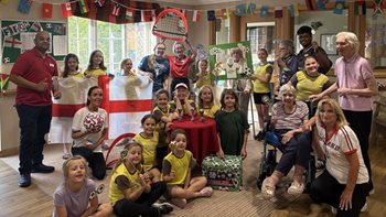 Stansted care home residents team up with local Brownies for matchday magic