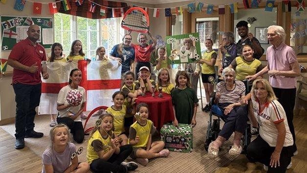 Stansted care home residents team up with local Brownies for matchday magic