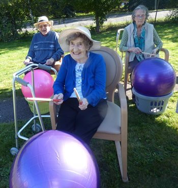 Drumming up a crowd! Epsom care home hits the right note with local primary school  