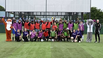 Edinburgh residents celebrate football fever with charity match and guest visit