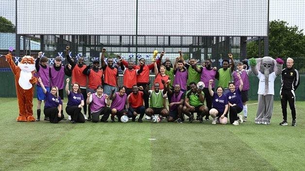 Edinburgh residents celebrate football fever with charity match and guest visit