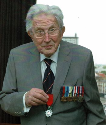 ‘Plenty of red wine!’ – Former Navy and D-Day veteran turns 100 revealing his secret to a long life 