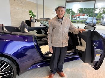 Licence to thrill! Care home surprises retired racing driver with an Aston Martin trip around his hometown