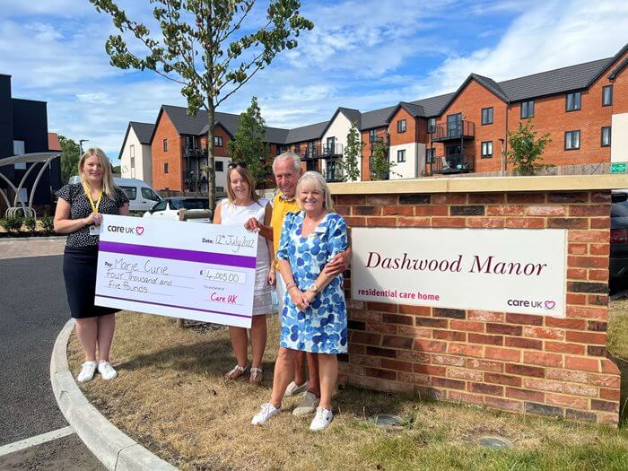 Dashwood Manor - Dashwood - Dennis cheque for Marie Curie
