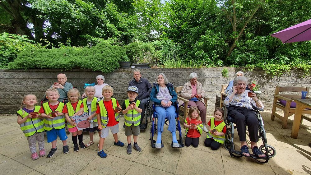 Residents at Colne View were reunited with their friends from the local nursery after two years apart.