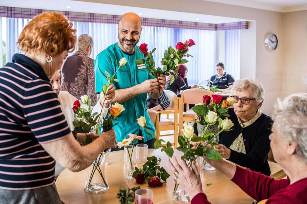 Senior Care Assistant - Armstrong House flower arranging 
