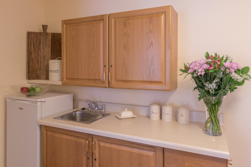 Private kitchenettes to promote independence 