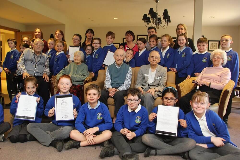 Kitchen Assistant - residents-at-care-uks-knebwroth-with-st-michael-s-primary-school-on-world-poetry-day-2 image