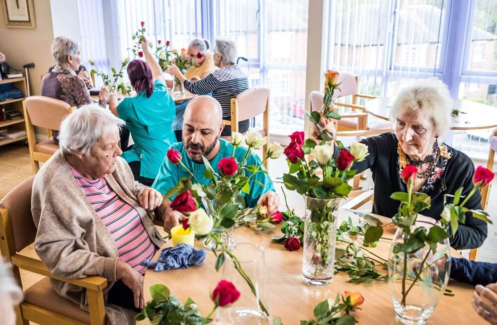 Senior Care Assistant - Armstrong House flower arranging 