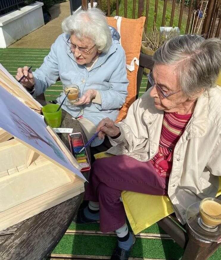 Metchley Manor's residents have been painting the home’s garden and sharing their skills with their grandchildren.