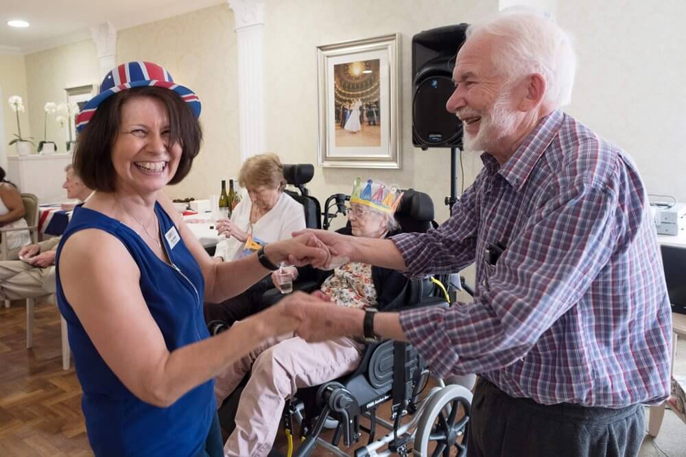 Weald Heights - joy-corbett-lifestyle-lead-and-john-hoyle-resident-celebrate-care-home-open-day image