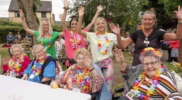 The team and residents at Field Lodge enjoying the festival fun