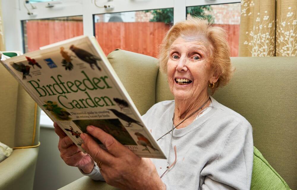 St Vincent's House - 04-resident-lillian-moore-at-care-uks-st-vincents-house-learns-about-birds-as-part-of-rspb-big image